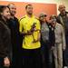 Trey Burke's family, from left, sister Amani, 14, father Benji, Trey, mother Ronda, grandmother Jackie and grandfather Alfonso Sr. poses for photos as Trey holds the United States Basketball Writers Association's Oscar Robertson Trophy on Friday, April 5, 2013 at the Atlanta Marriott Marquis in Atlanta, GA. Melanie Maxwell I AnnArbor.com